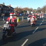 Salford Santa Scooter Run  to The Christie